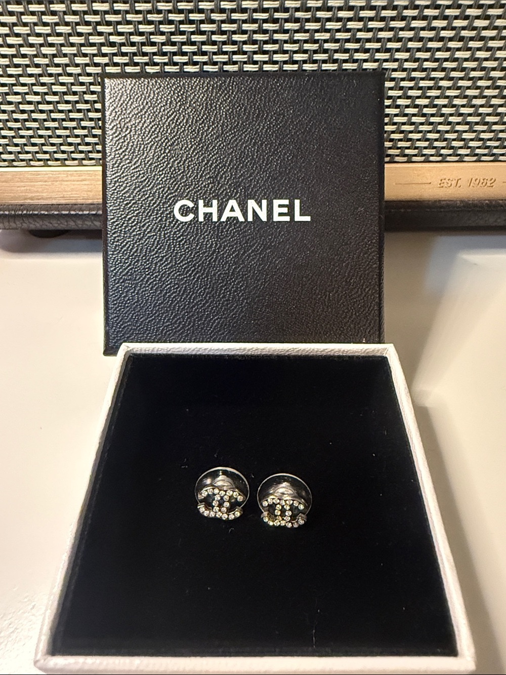 CHANEL Silver Logo Stud Earrings